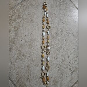 Elegant Gold and White Necklace